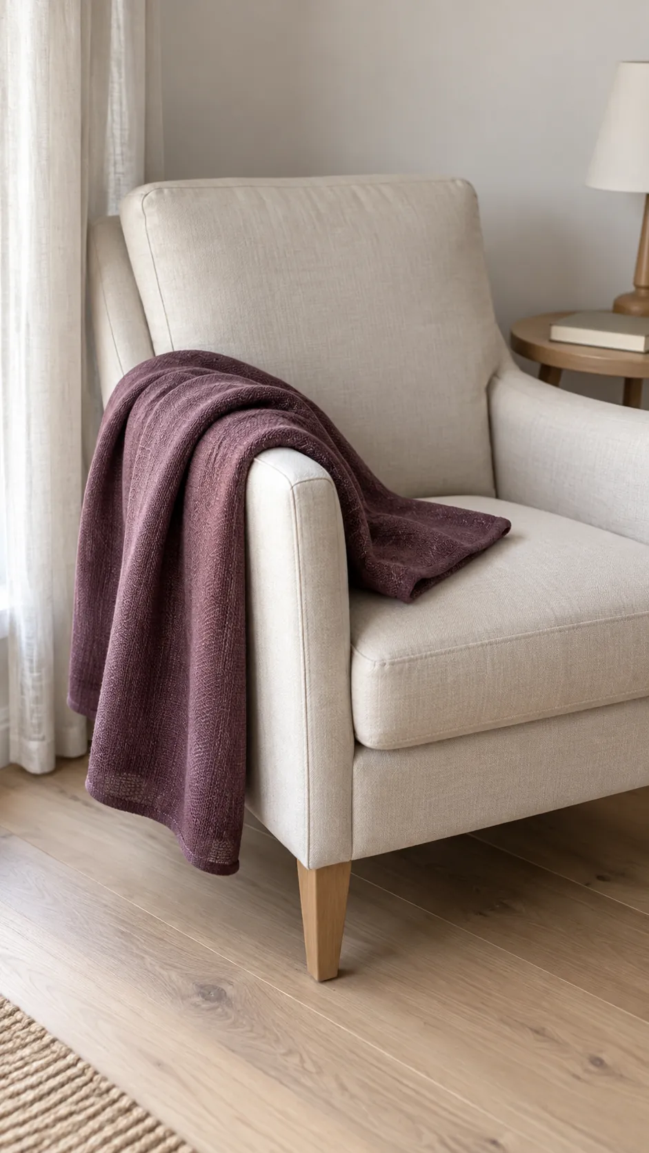 A plum accent tucked into a neutral nook for coastal fall decor