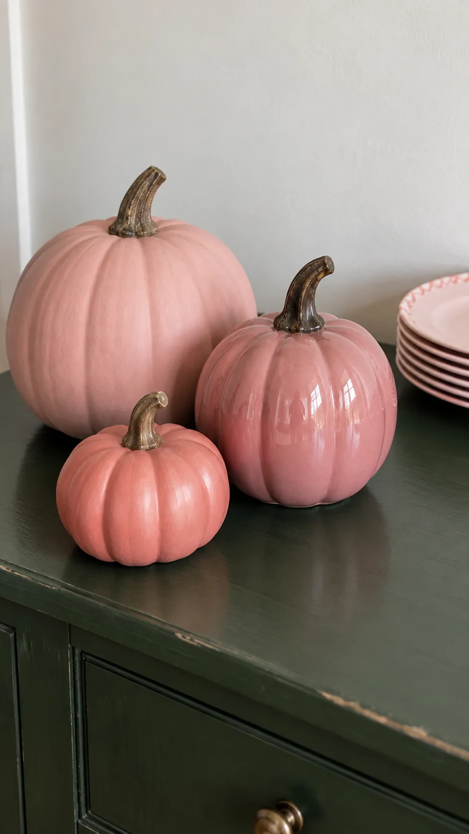 Pink pumpkins in different finishes for a pink Halloween birthday party