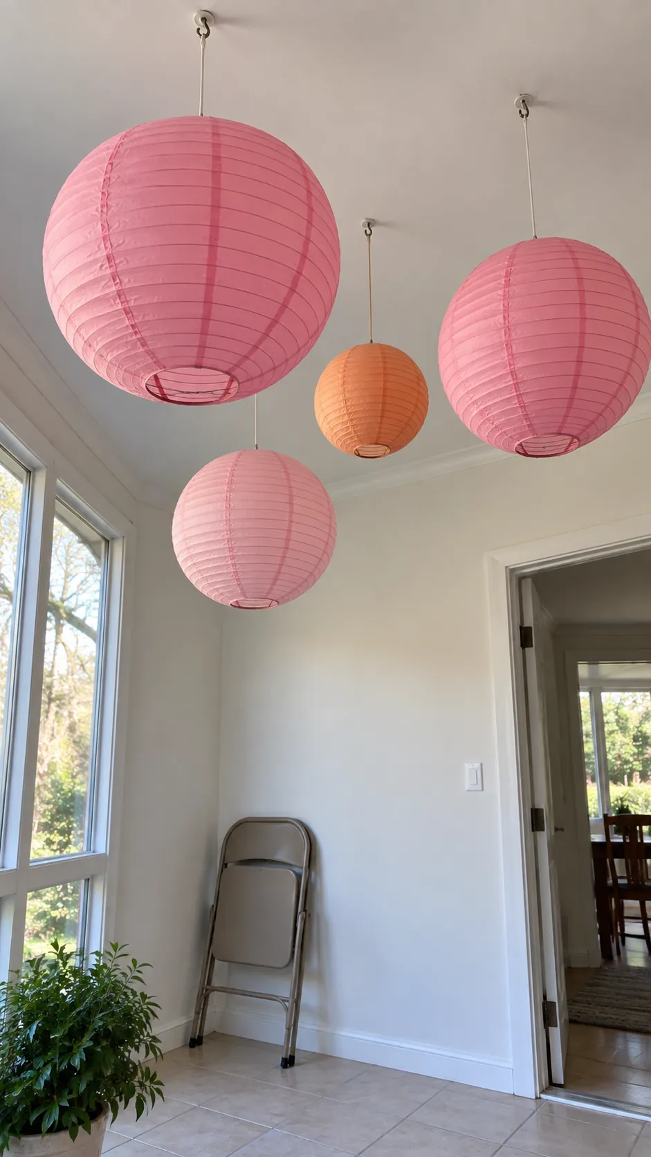 Pink and orange paper lanterns for a pink Halloween birthday party