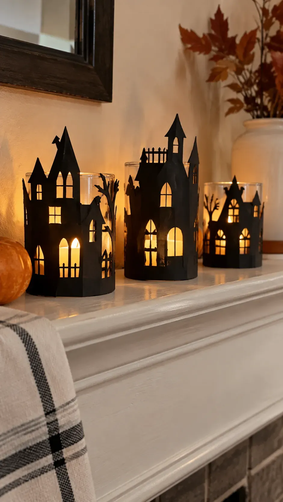 Cheap DIY Halloween decoration showing black cardstock candle sleeves
