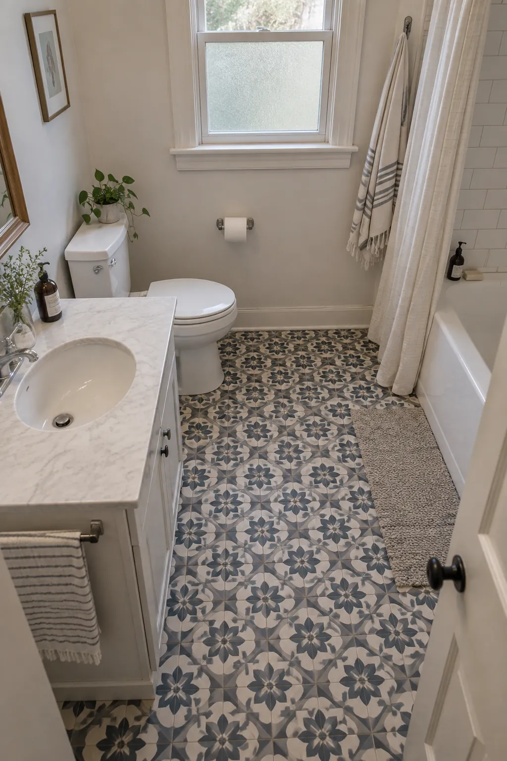 Patterned Floor with Calm Walls in a tiny full bathroom