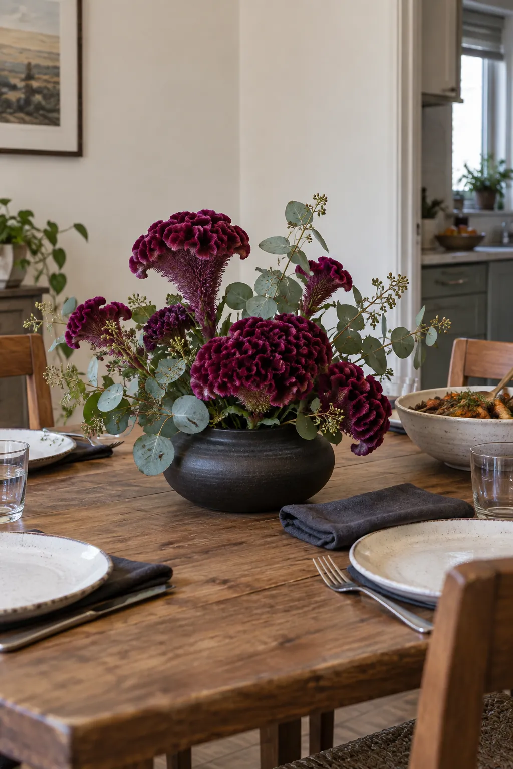 Celosia in a Dark Clay Vessel as a fall flower centerpiece for Thanksgiving