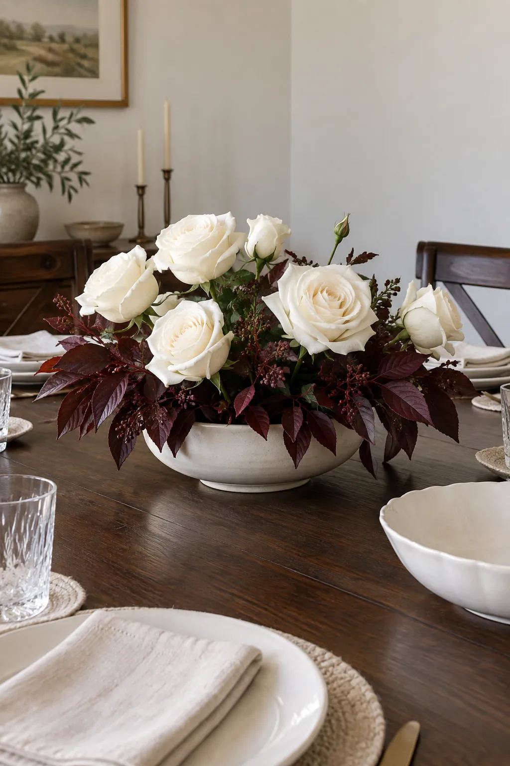 White Roses with Burgundy Foliage as a fall flower centerpiece for Thanksgiving