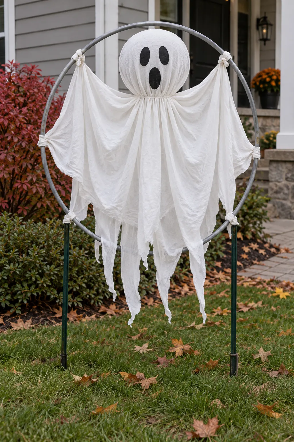 Hula Hoop Ghost Ring as a DIY outdoor Halloween ghost display without a tree