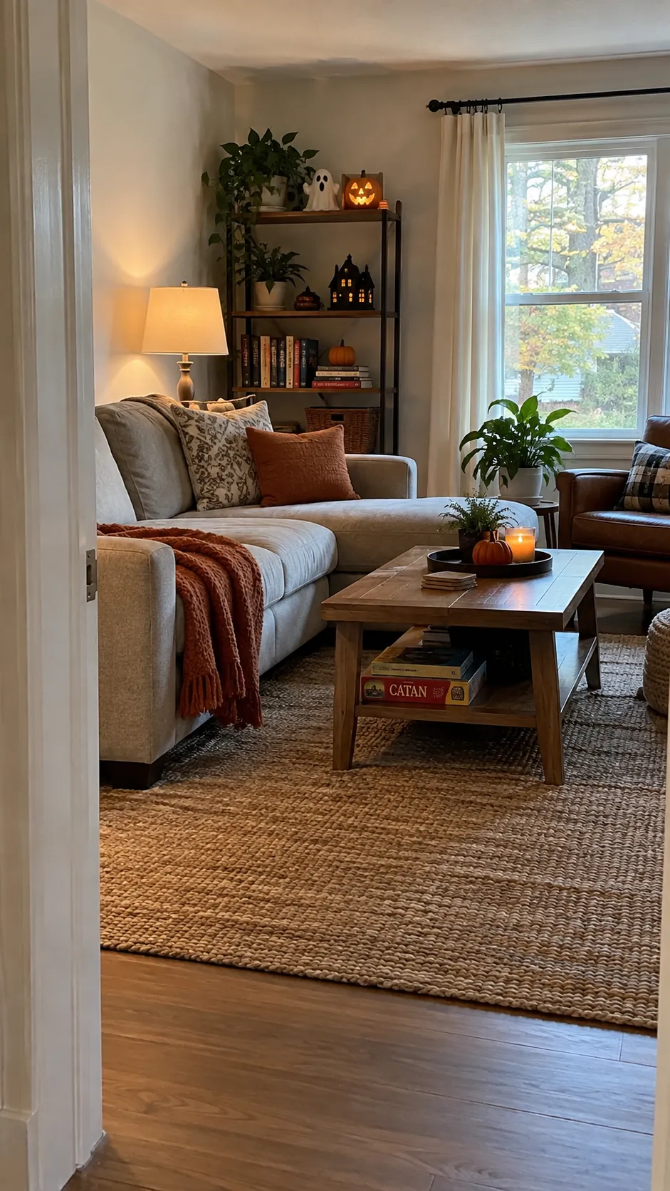 Family living room with restrained Halloween decor and usable seating