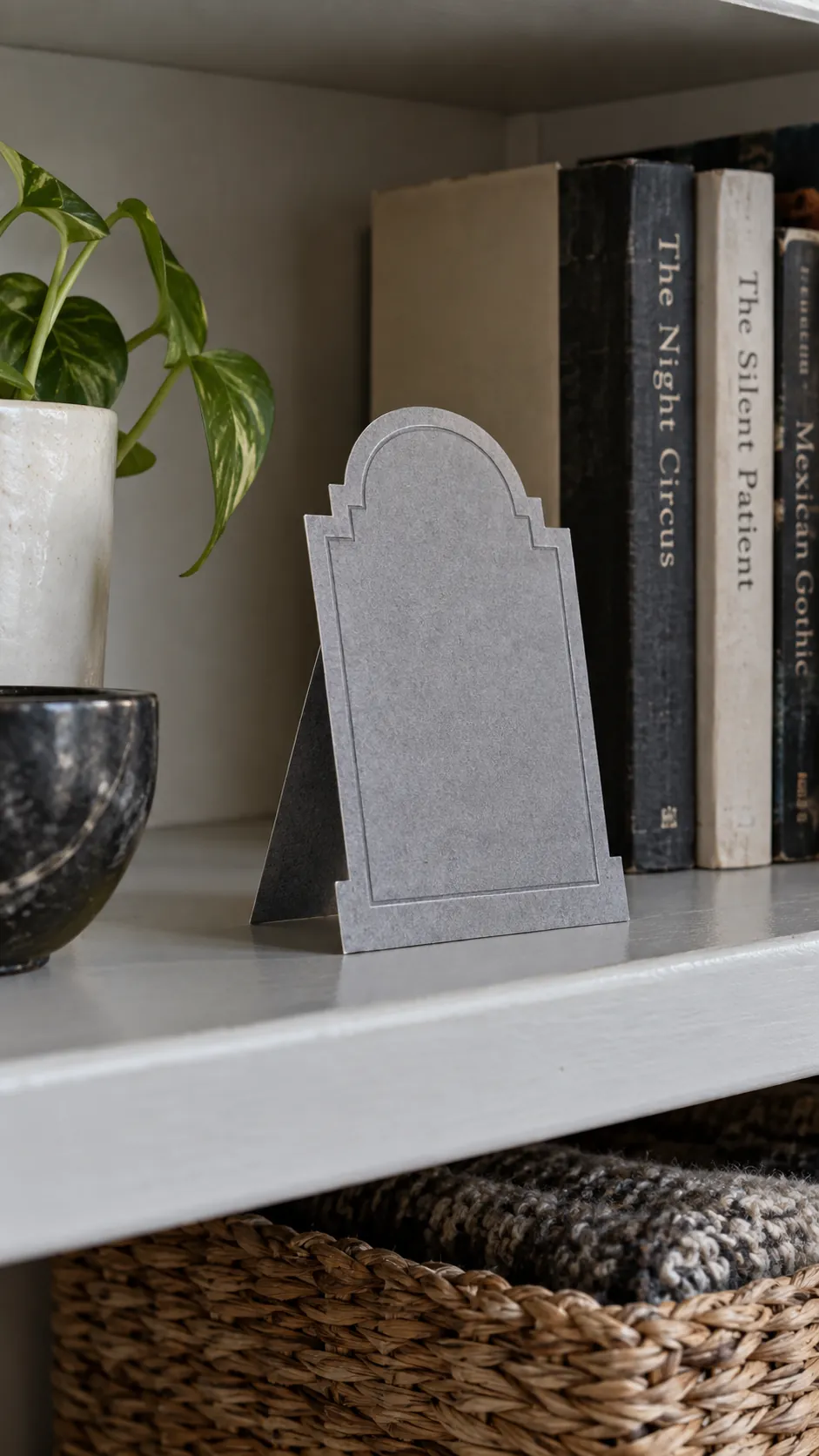 A folding cardstock tombstone that stores flat in an apartment