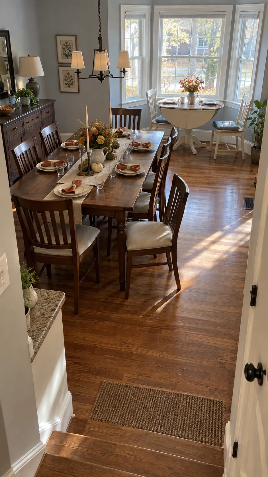 Two dining tables arranged with a clear route between the kitchen and guests