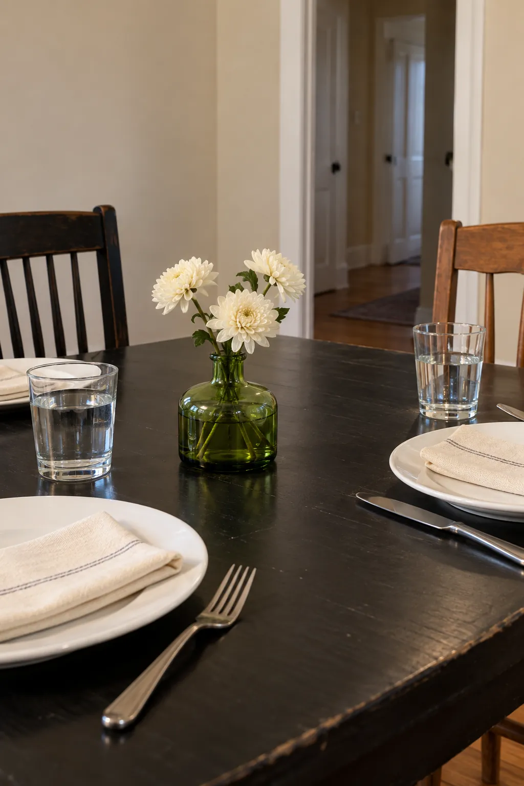 One green bottle vase for the center with everyday white dishes