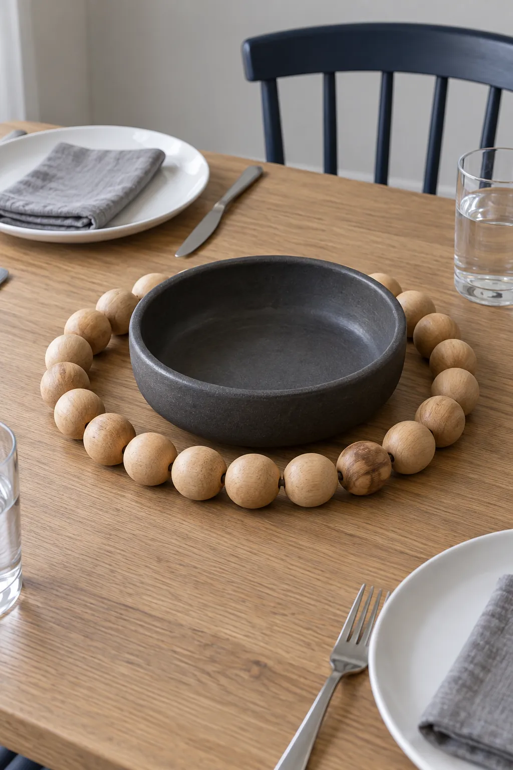 A ring of large wooden beads as a Thanksgiving centerpiece without candles
