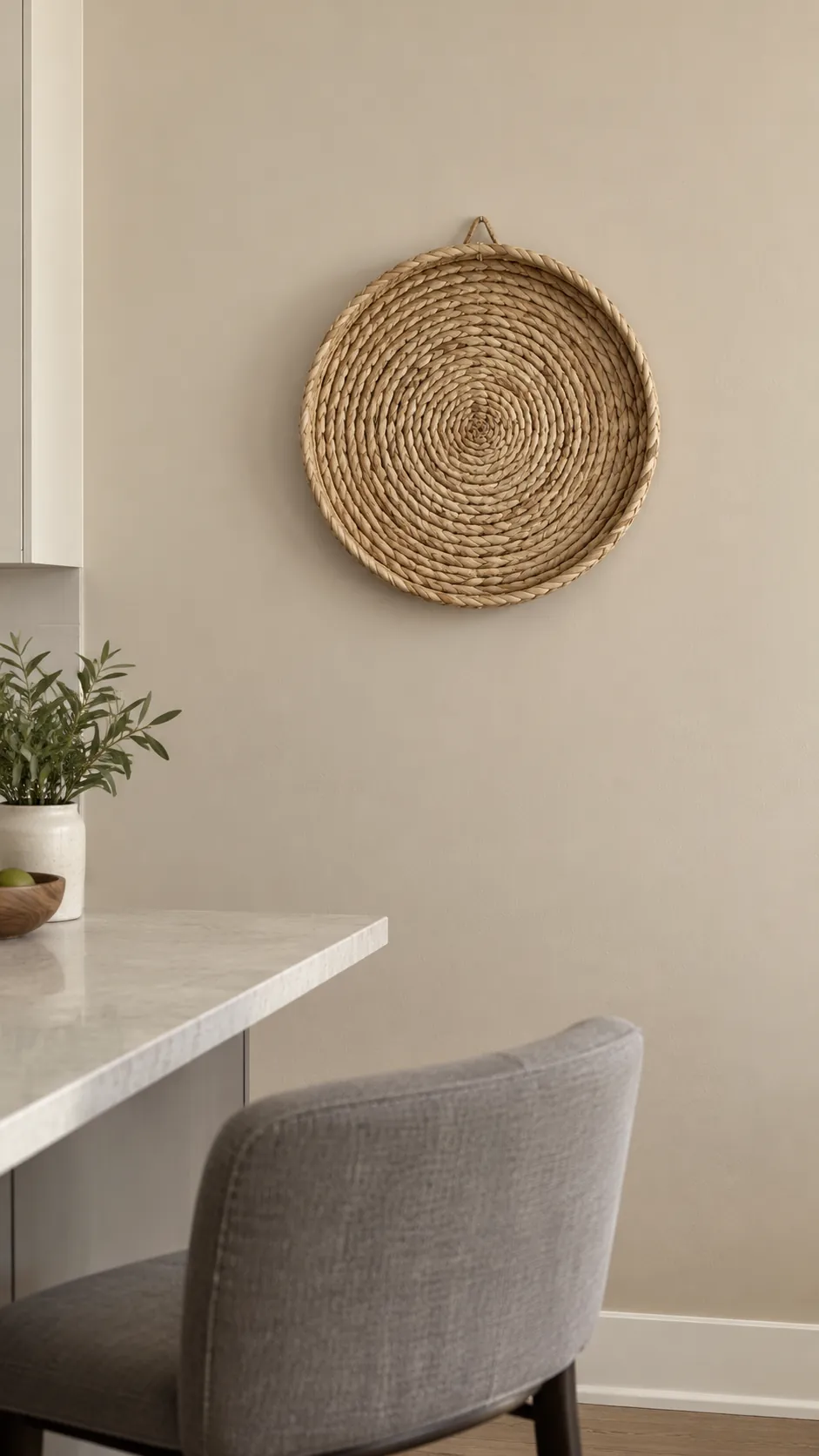 A woven basket as a wall accent in a practical kitchen