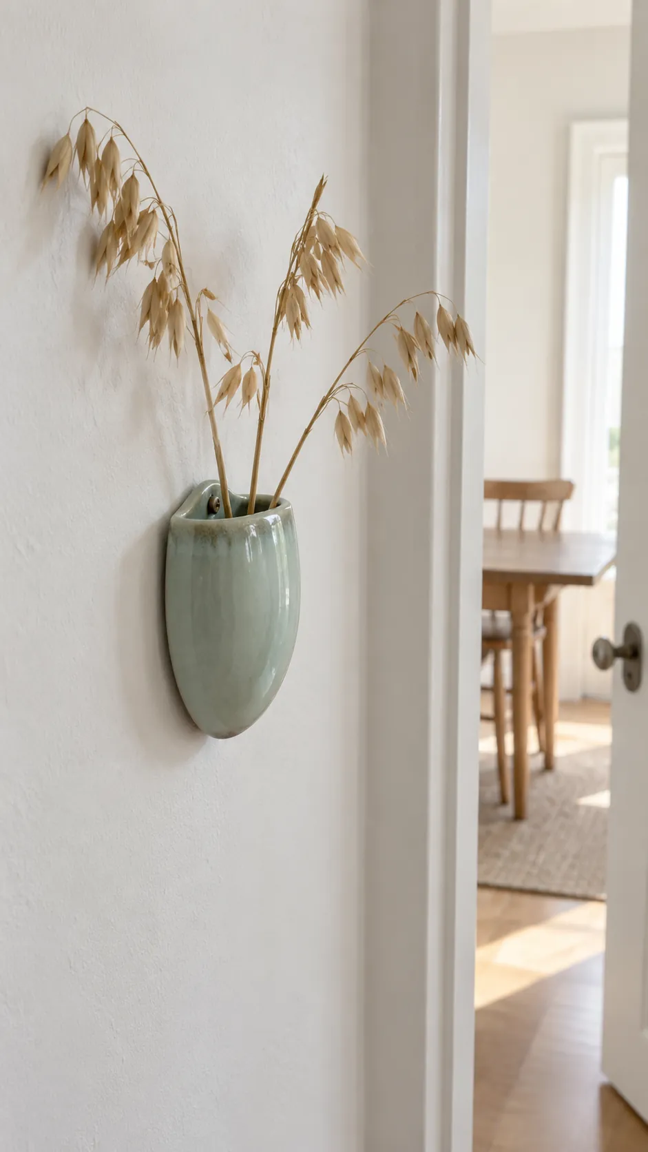 A small ceramic wall pocket in a practical kitchen