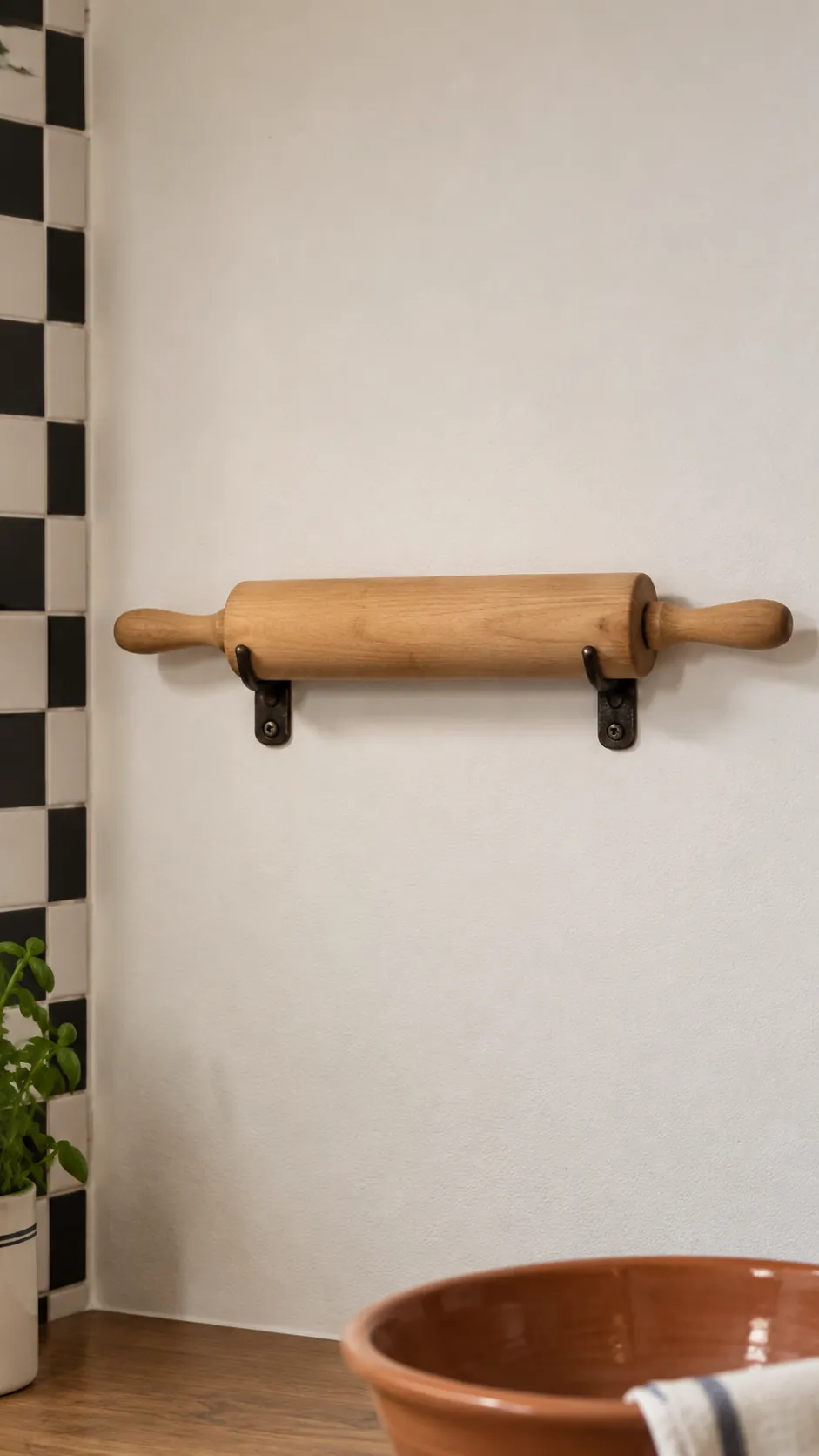 An open patch with one hanging utensil in a practical kitchen
