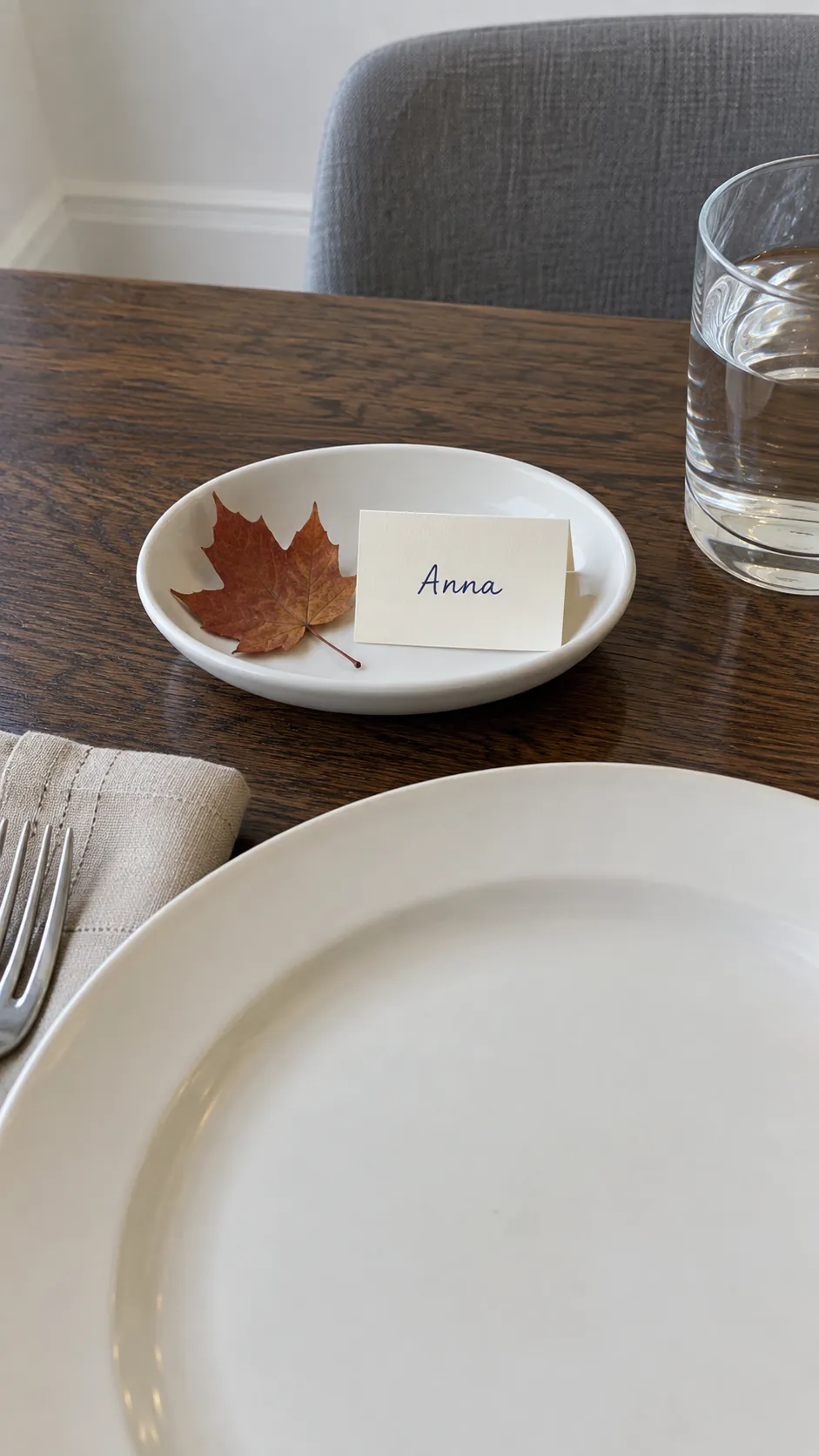 Pressed Leaves beside Name Cards in a vintage Thanksgiving setting