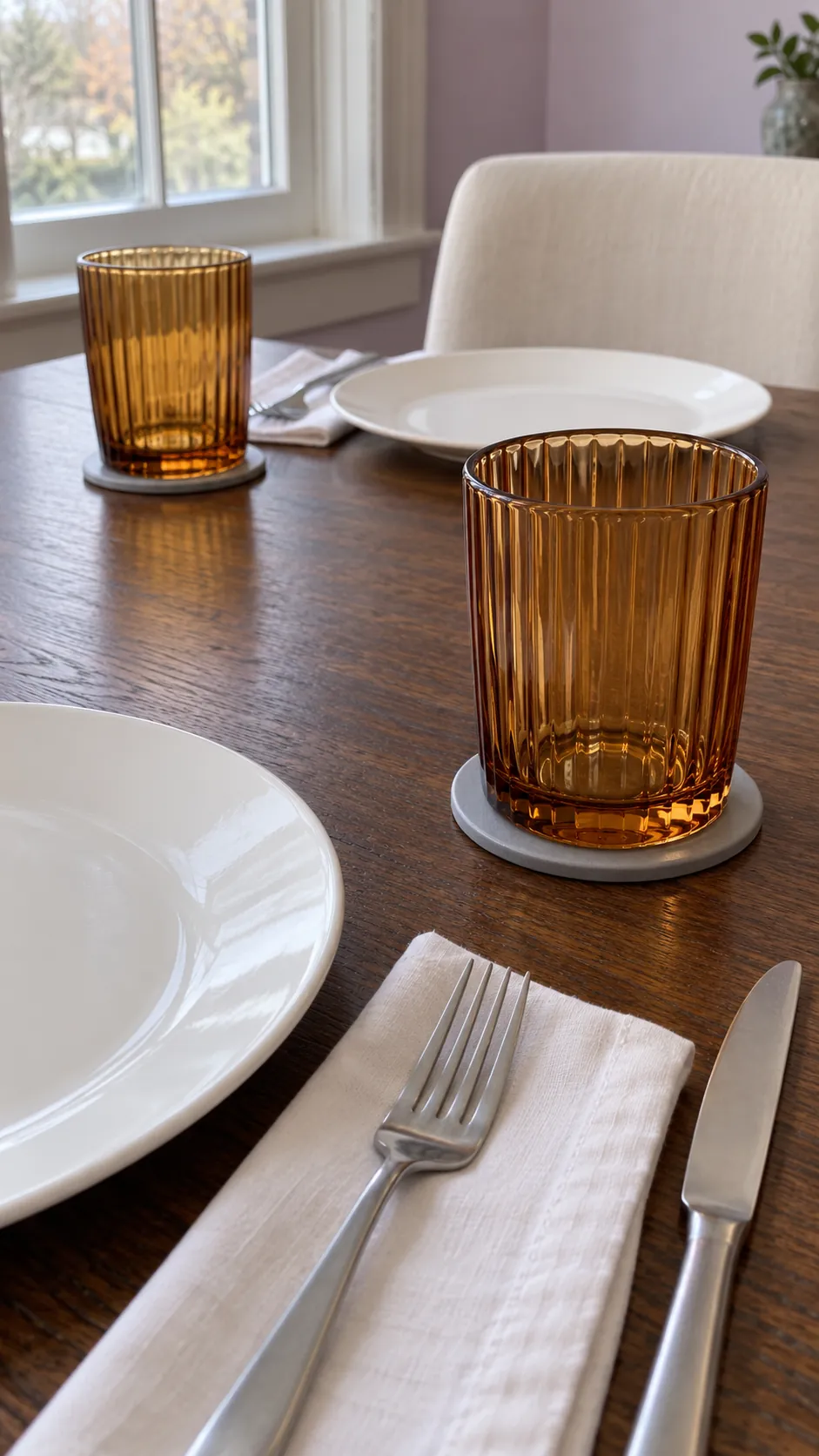 Amber Tumblers with White Napkins at a practical modern Thanksgiving setting