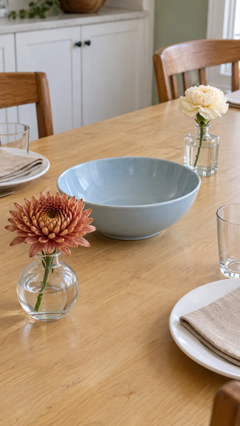 Two Bud Vases with Short Flower Stems at a practical modern Thanksgiving setting