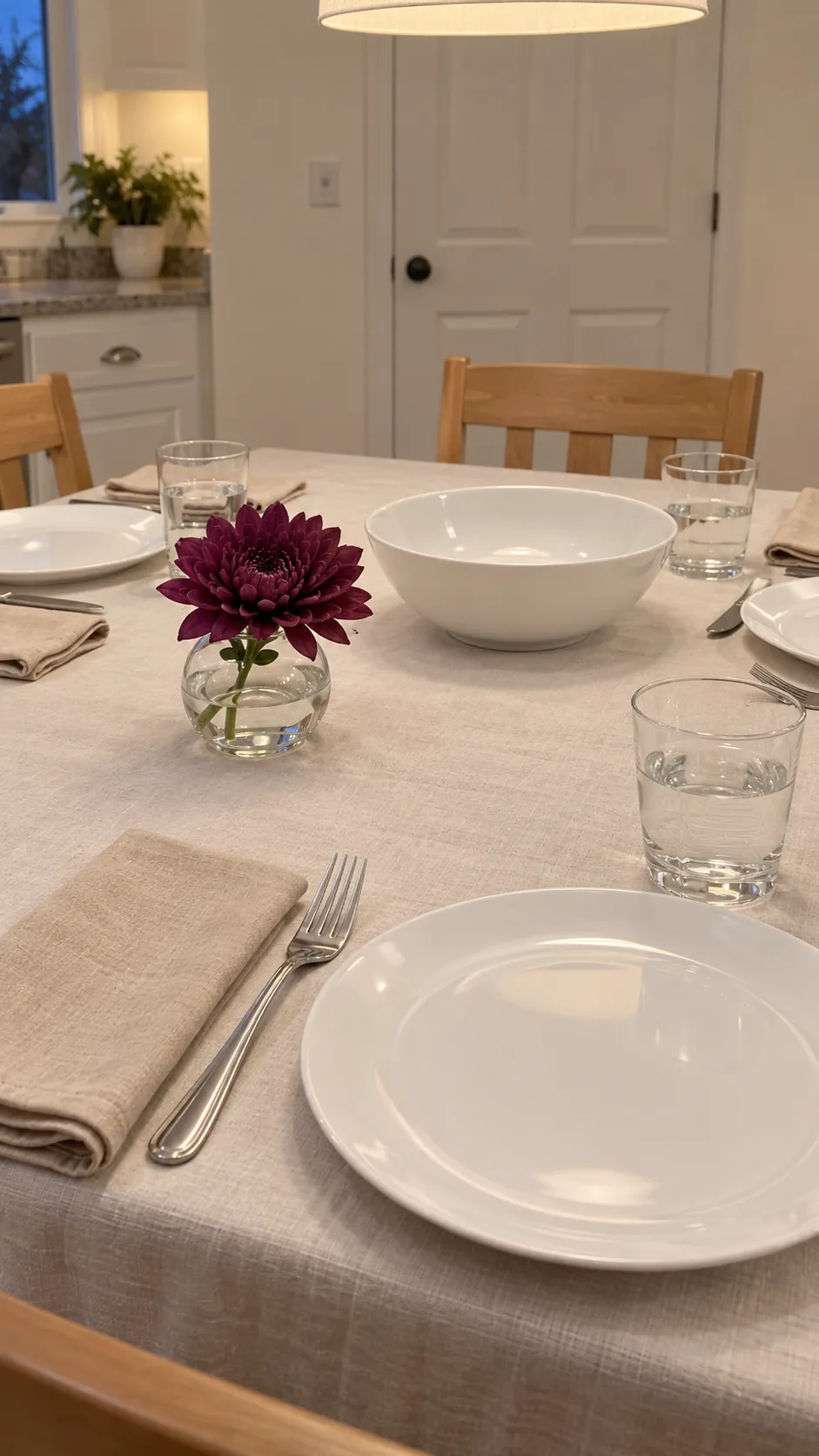 Neutral Textiles with a Plum Accent at a practical modern Thanksgiving setting