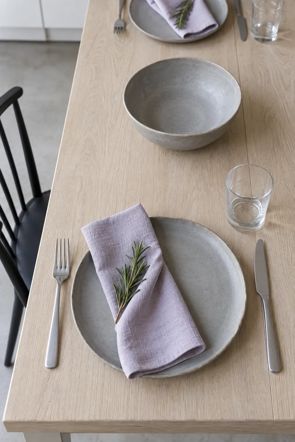 Stoneware with Rosemary Napkin Folds on a practical Thanksgiving dining table