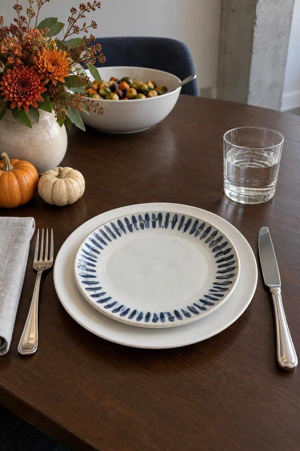 Silver Flatware with Blue Ceramic Accent Plates for a blue and white Thanksgiving table