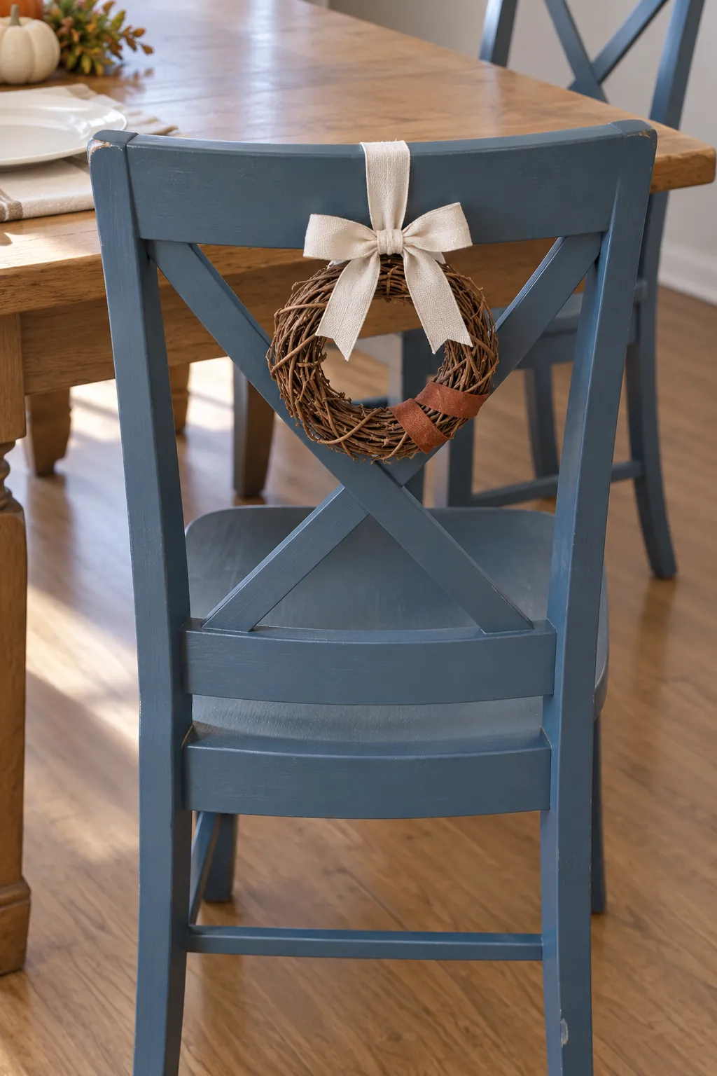 Ribbon Wreaths on Chair Backs Thanksgiving decor idea