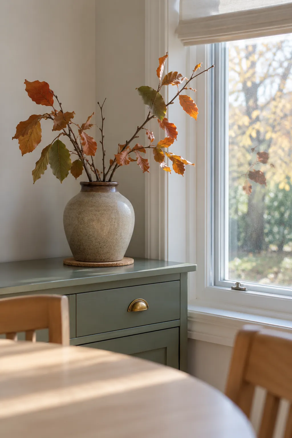 A Branch Arrangement by the Window Thanksgiving decor idea