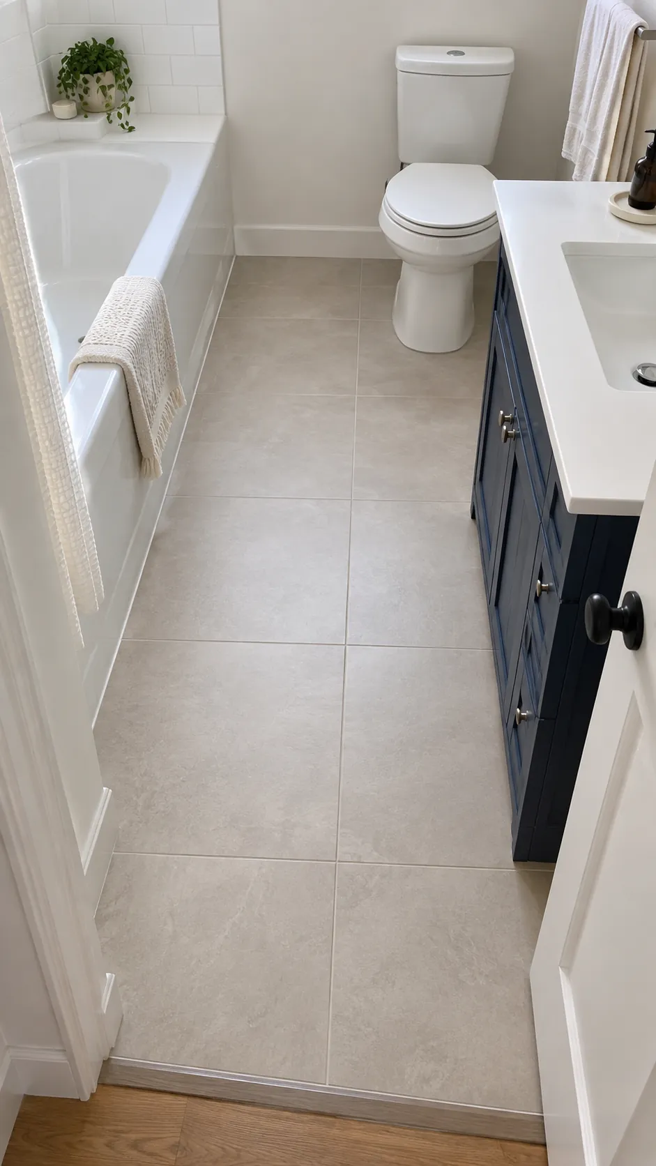 One continuous dry area floor in a small bathroom