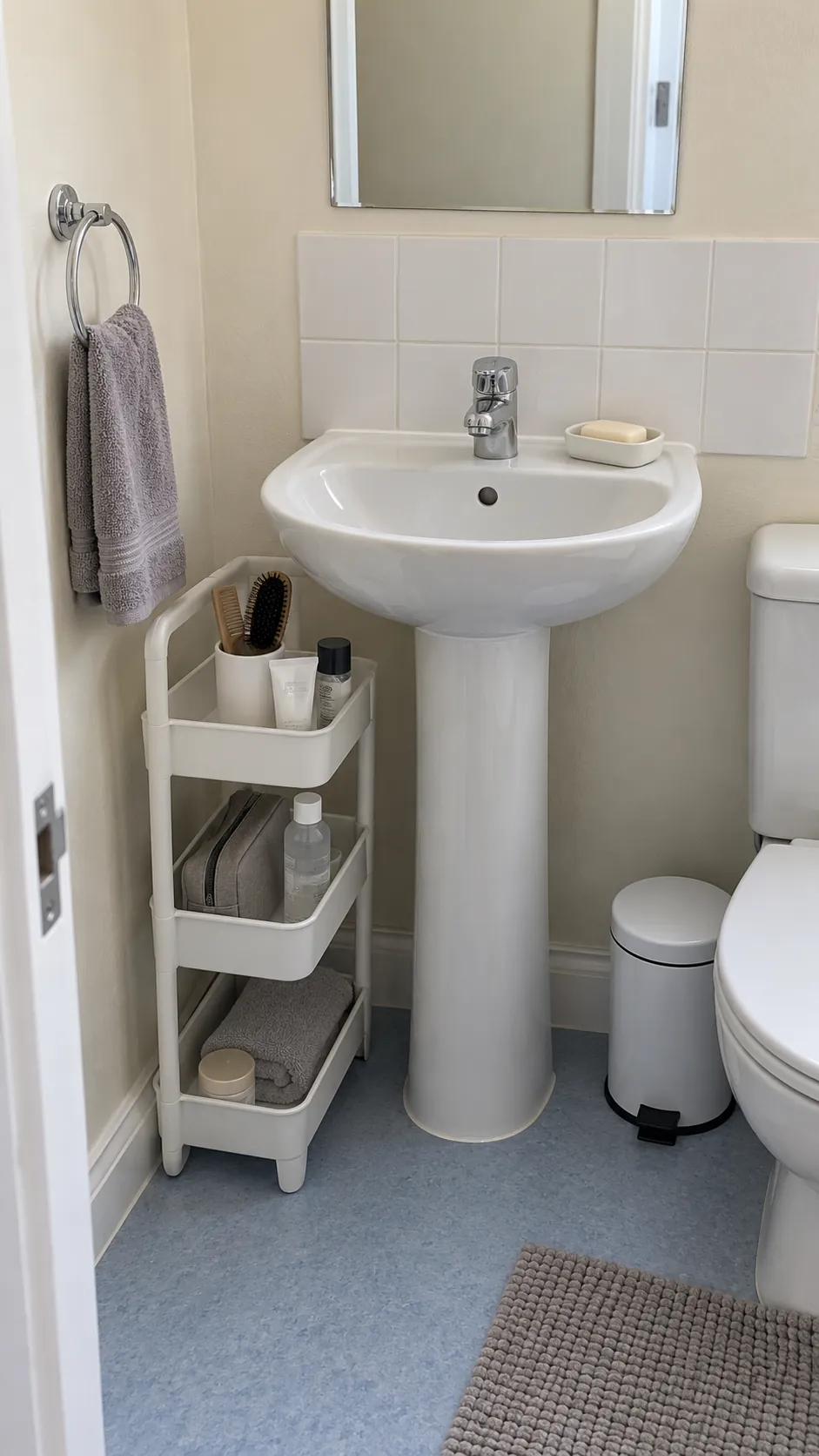Storage matched to a pedestal basin for two people sharing one sink