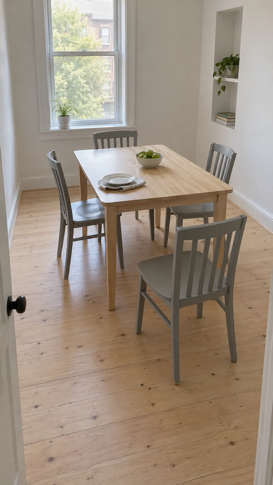 Rectangular dining table with clear floor around each occupied side