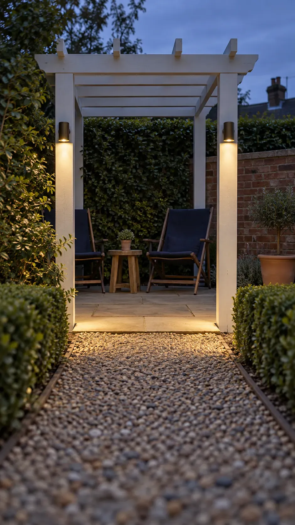Post lights at the entrance in a compact outdoor pergola setting