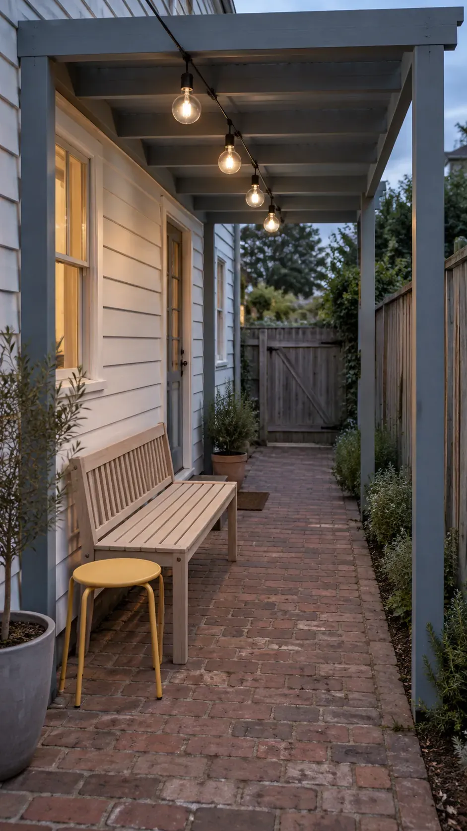 A limited number of bulbs for a narrow canopy in a compact outdoor pergola setting