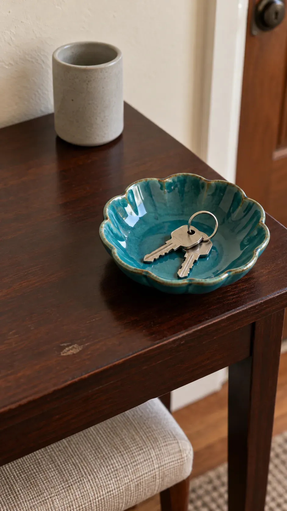 A Colorful Dish as the Main Accent on an entryway console with accessible keys