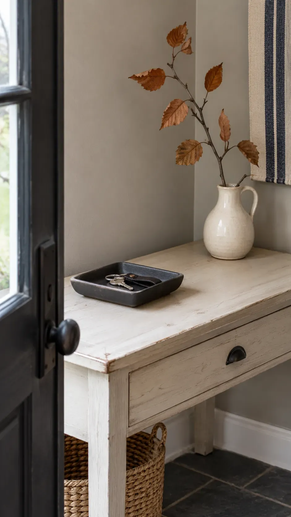 A Seasonal Accent in a Fixed Corner on an entryway console with accessible keys
