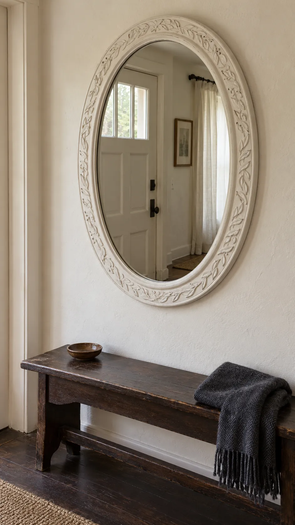 Choose a soft white frame to lighten a dark border on an existing entryway mirror