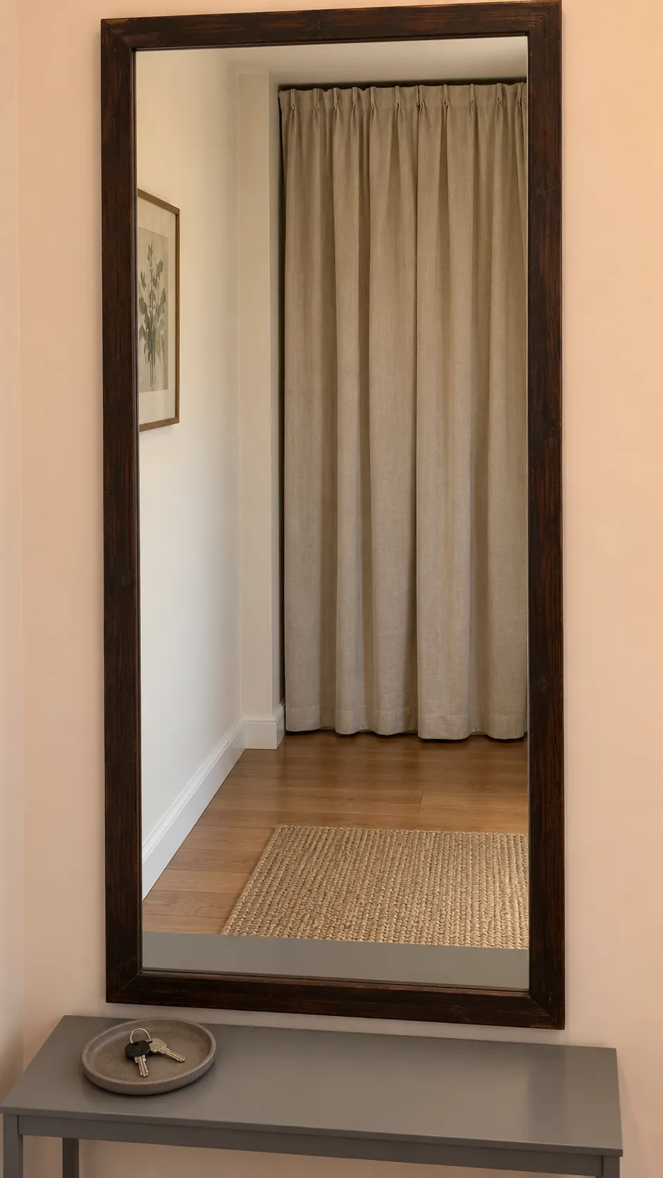 Lower the visual clutter in its reflection on an existing entryway mirror