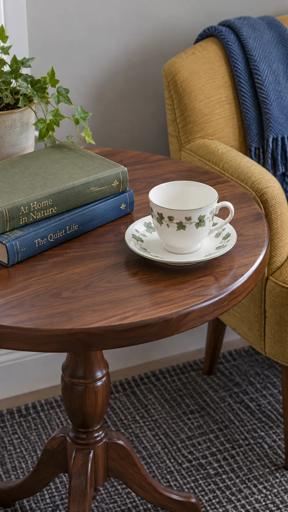 Create a small reading nook vignette with inherited teacups