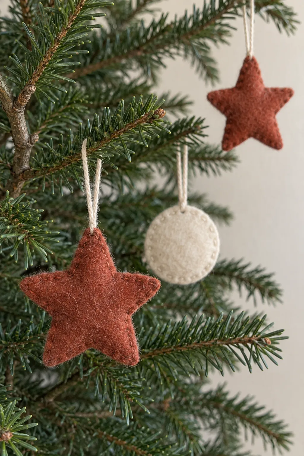 A few wool felt tree ornaments in a natural Christmas home