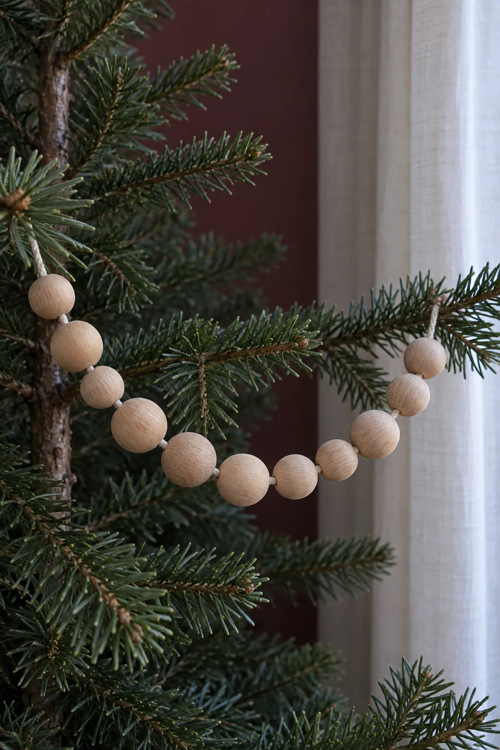 A wooden bead strand in a natural Christmas home