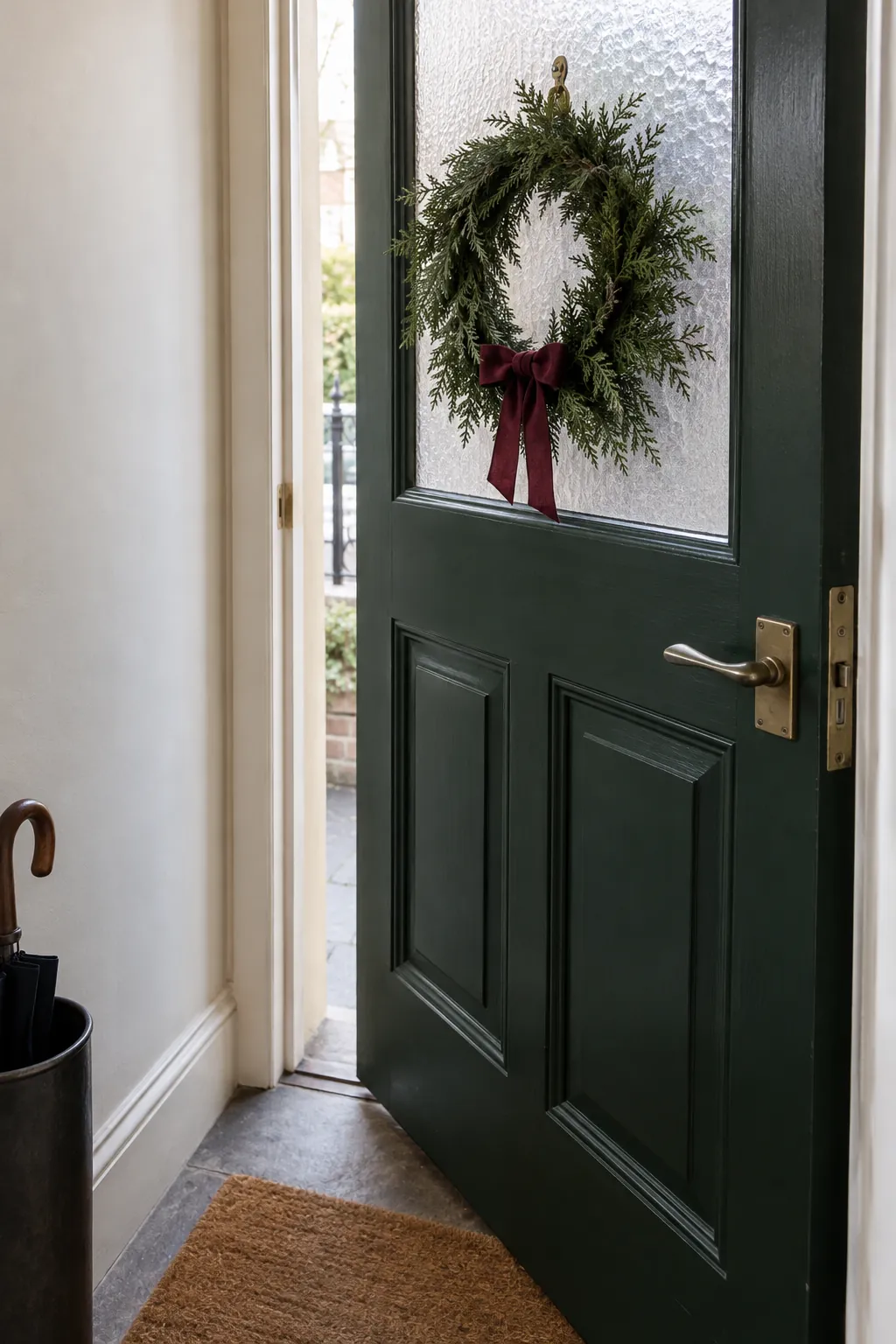 Choose a slim door wreath in a Christmas entryway without a tree
