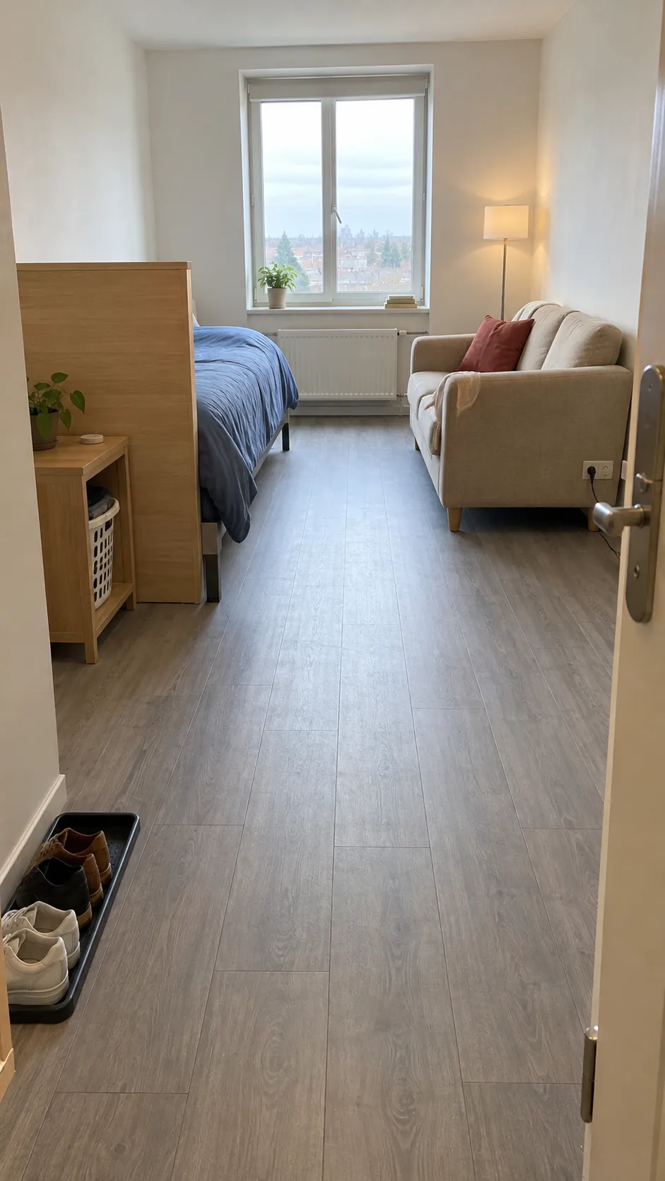 Clear walking route between a studio bed and sitting area