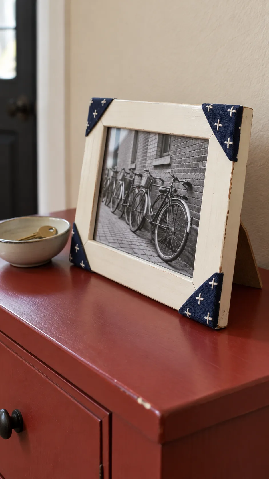 Fabric patches on the corners of a tabletop photograph frame