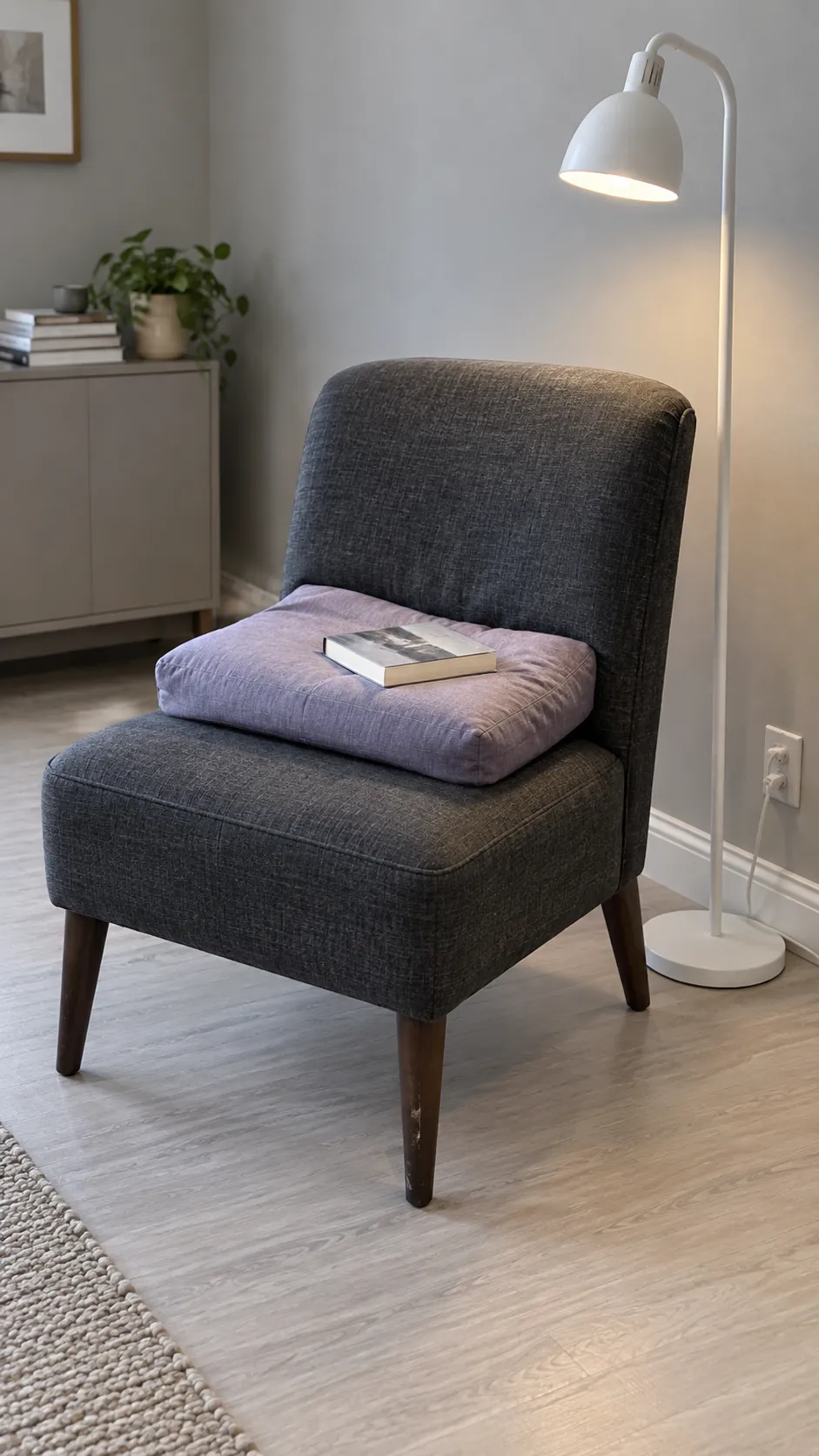 Armless chair and lap cushion in a small living room
