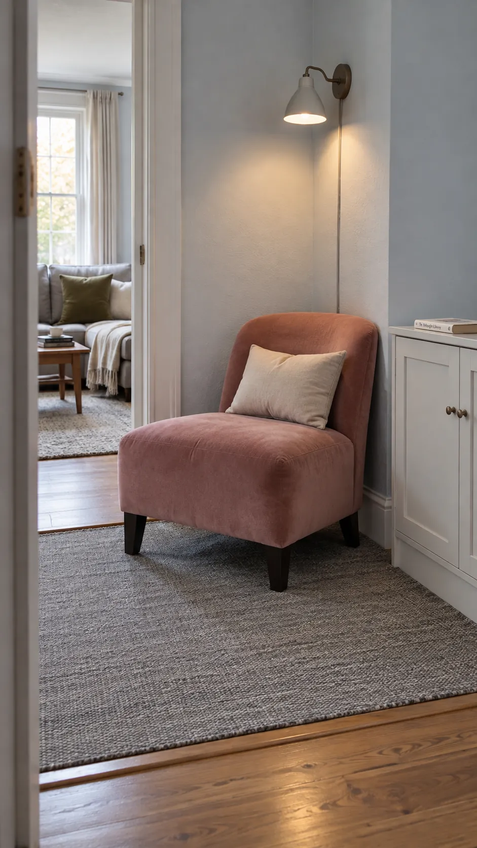Slipper chair on a short wall in a small living room