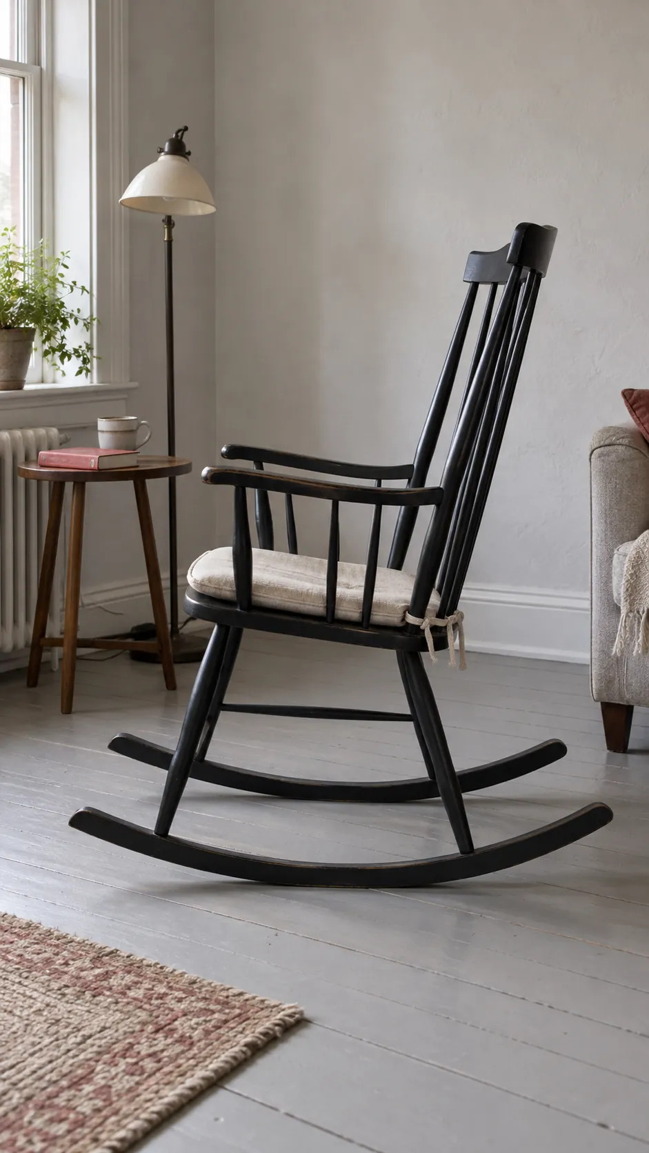 Slim rocker with clear runners in a small living room