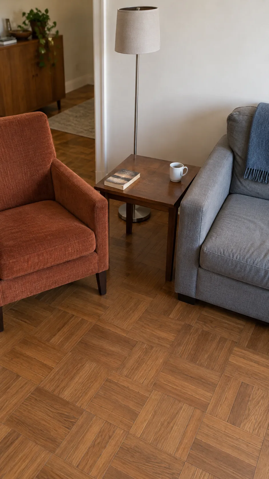 Chair and sofa sharing a table in a small living room