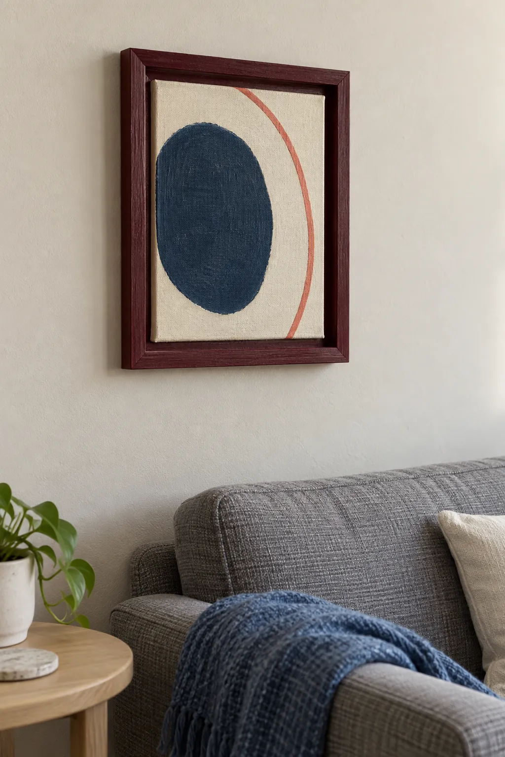 Small abstract canvas fitted into an old wooden frame