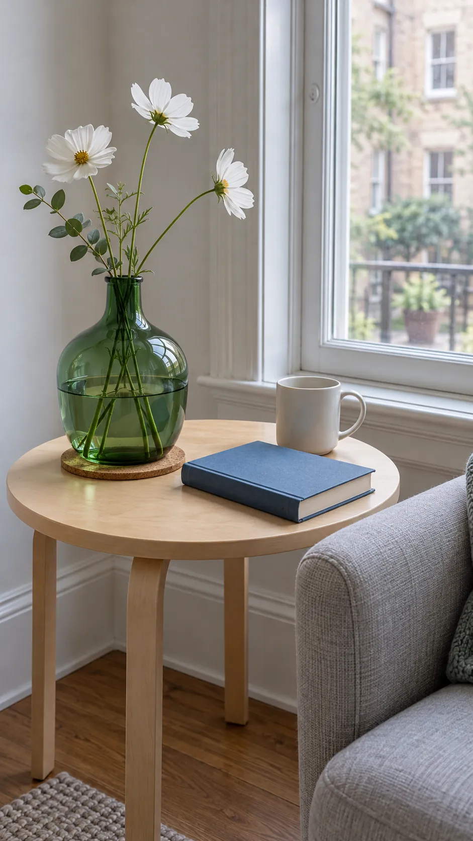 Green vase in a reading corner
