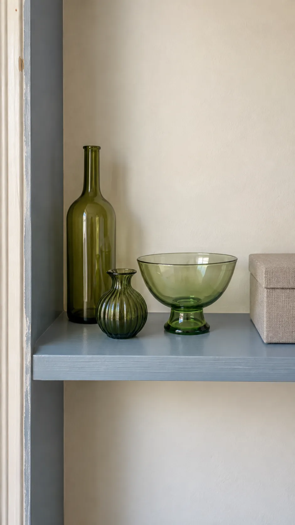 Vintage green glass shelf display