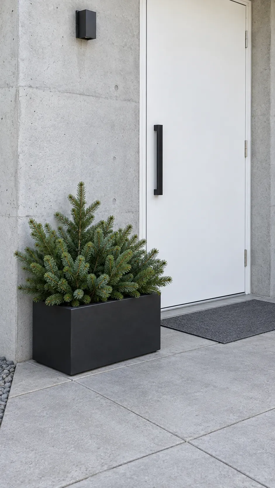 Keep a modern pot to one type of greenery in a practical Christmas porch planter