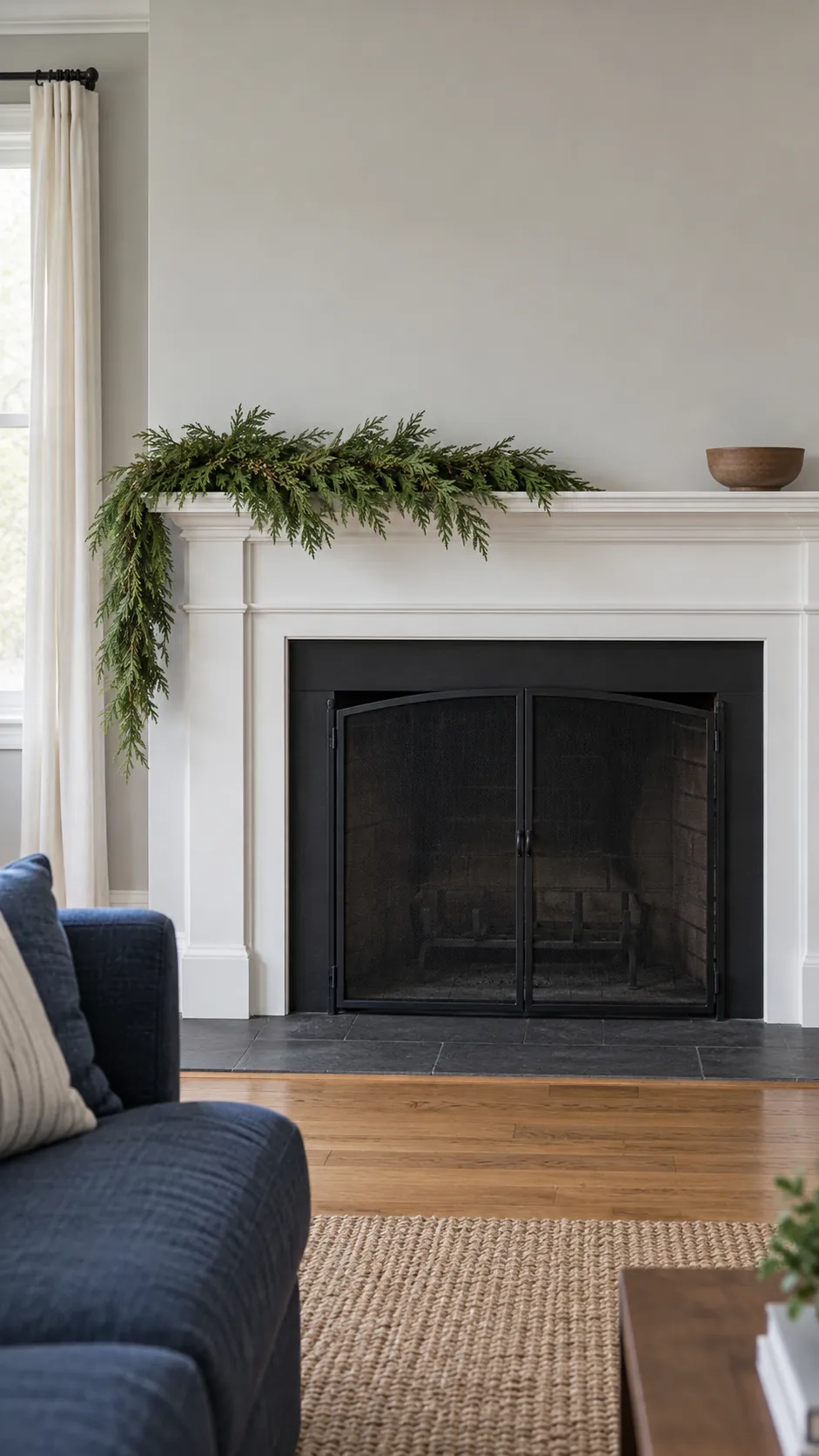 A single garland on an unused mantel for minimalist Christmas decor