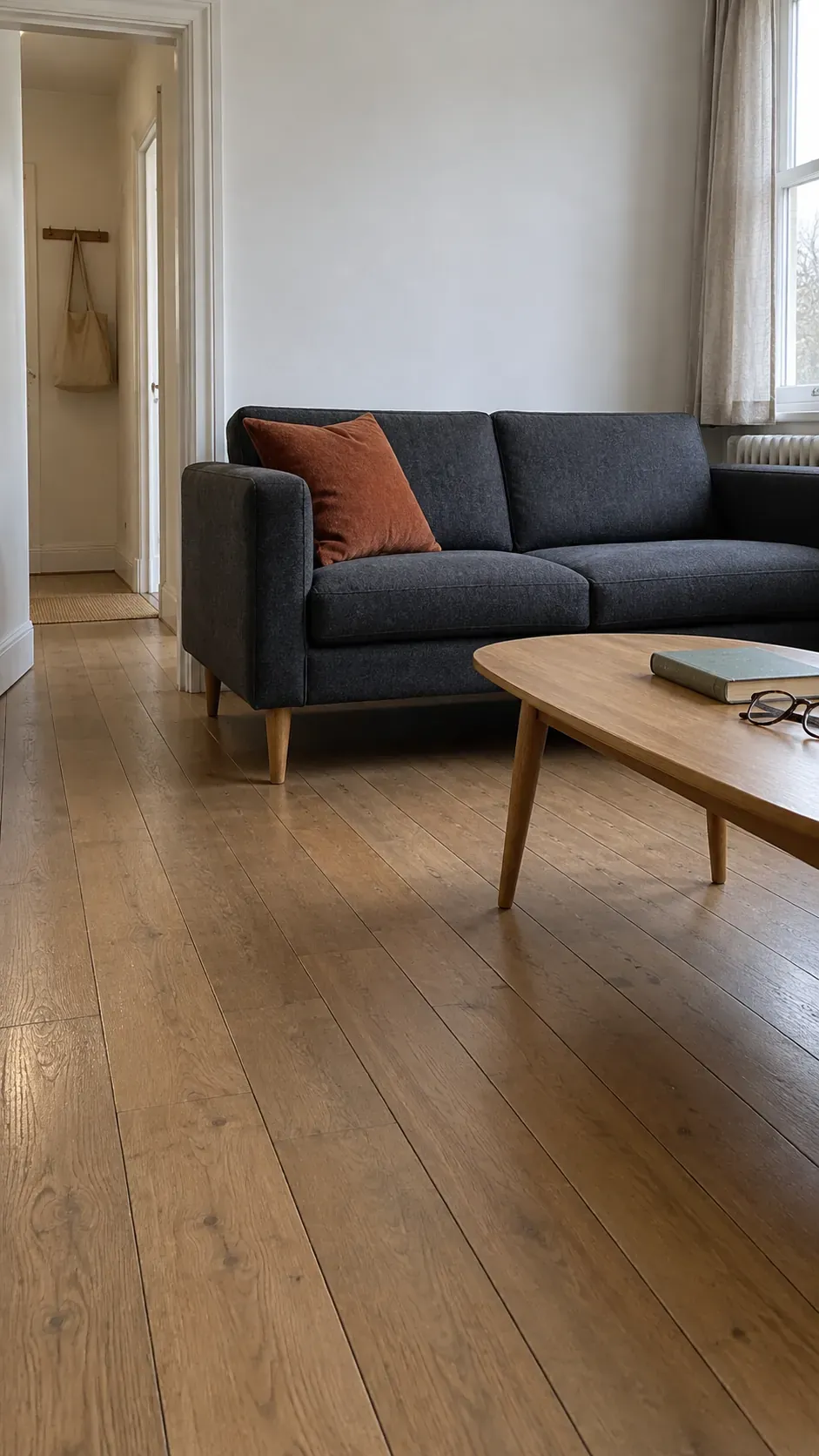 Floor clearance in a narrow sitting room inspired by 1950s interior design