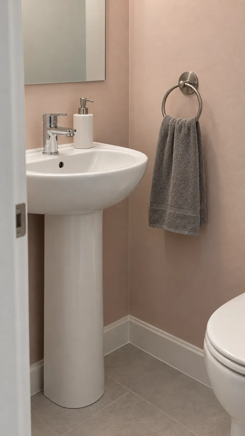 A ring solves the narrow towel gap in a guest bathroom